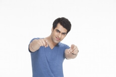 man pointing his fingers