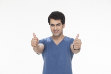 man doing thumbs up with both the hands