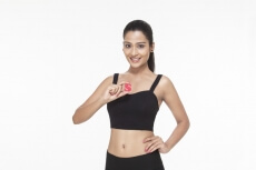 girl posing with alphabet S
