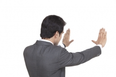 back view of a businessman giving presentation