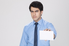 man showing white placard