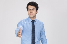 man putting forward his hand for handshake 