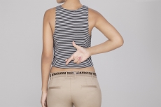 girl showing finger crossed behind her back