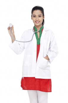 doctor smiling and posing with a stethoscope 