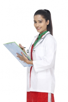 doctor smiling and posing with a cardboard