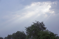 sunlight coming through the cloudy weather