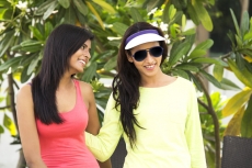 girls in park smiling