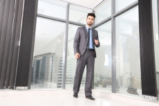 man posing in formal wear