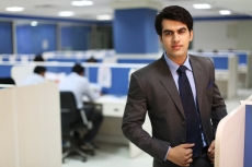 man in formal attire at work
