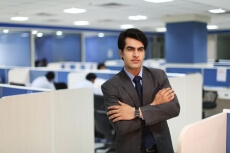 man in formals folding hands