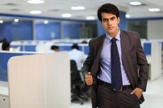 man posing in formal wear