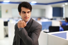 man in formal clothing posing