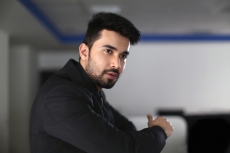 man in formal clothing posing 