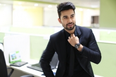 man in formal wear posing 