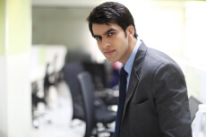 man in formal wear posing 
