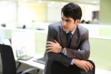 man in formal wear posing   