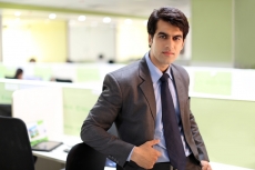 man in formal wear posing   