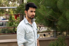 man in formals standing outside 