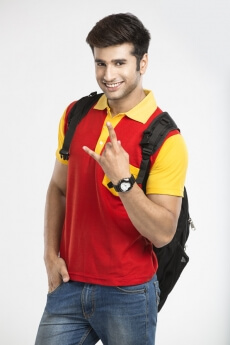 young guy smiling while gesturing in style 