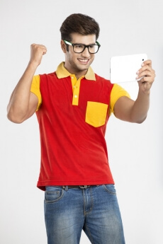 man gesturing while watching video on pad
