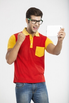 guy enjoying video on tablet