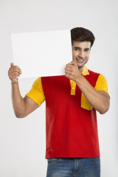 man posing with placard