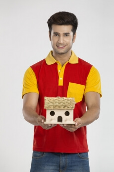 man posing with home miniature