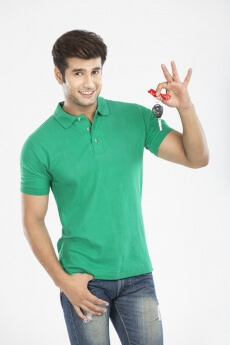 man showing car key and smiling 