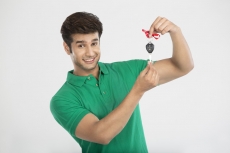 man showing car key as gift 