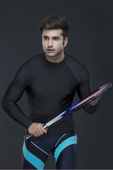 man with tennis racket in action while playing tennis