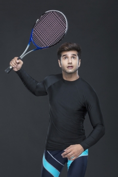 man in action while playing tennis