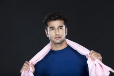 man posing with towel 