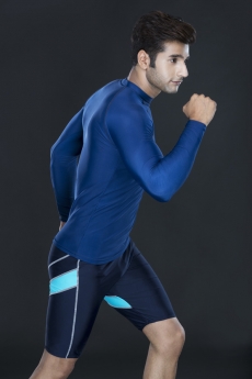 man as athlete running while posing for the camera 