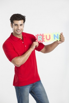 guy posing with jigsaw puzzle 