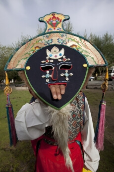 people with traditional masks at the ladakh festival