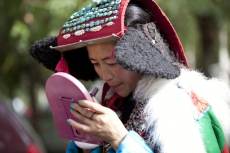 portrat of a tibetan woman in a traditional dress code