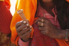 close-up of a woman smoking chillum