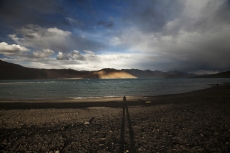 sunlight falling on the beautiful mountains of ladakh along river side