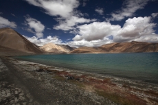 river side view of mountains