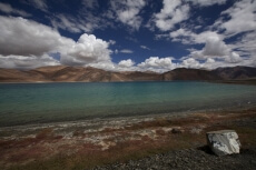 beautiful mountains along lake side   
