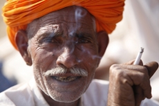 village man smoking cigarette 