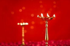 diya stand and rose petals 