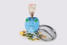 piggy bank with gold coins,note and stethosocope