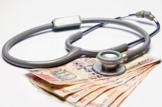 stethoscope and cash