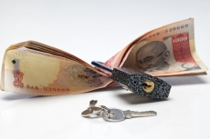 cash with lock and keys 