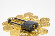 gold coin and lock