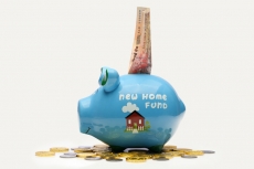 piggy bank with 1000 note and coins