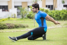 young man in park exercising 