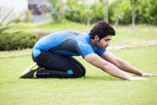 man exercising in park