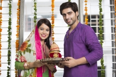 couple with pooja thali and kalash 